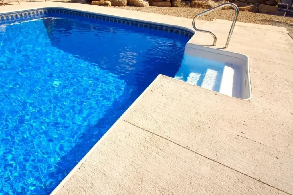 broom finish concrete pool surrond