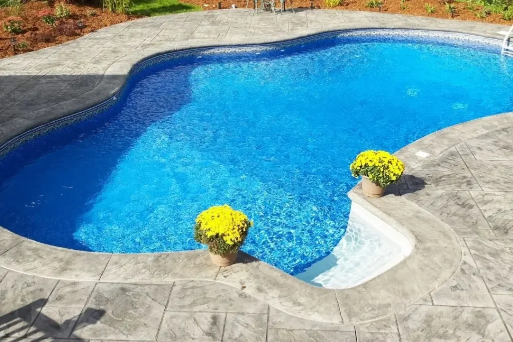 stencilled concrete pool surround